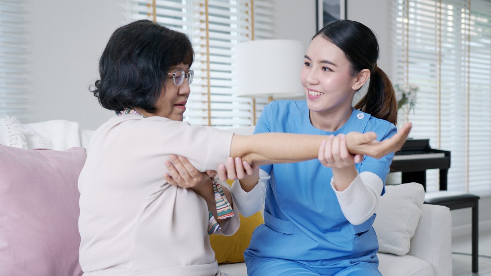 nurse physiotherapy worker at home in rehabilitation therapy service