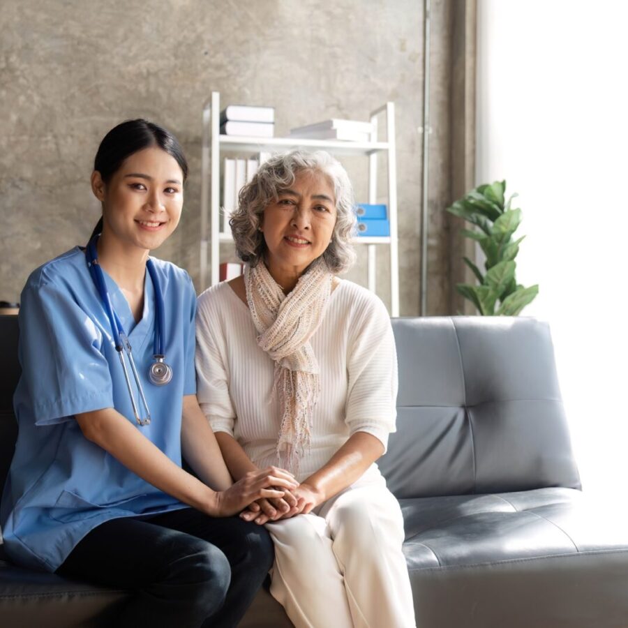 Asian senior female patient consult with physician nurse at nursing home