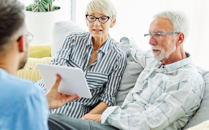 nurse doctor senior couple care caregiver help assistence retirement home nursing elderly man woman