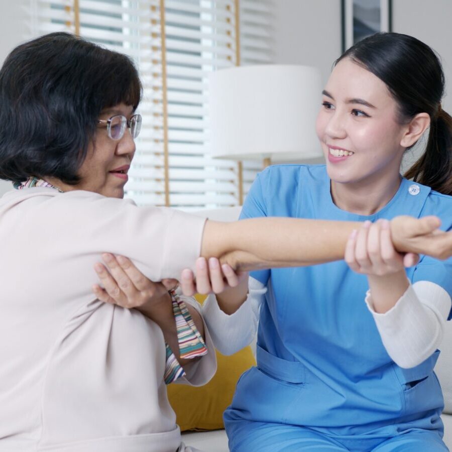 nurse physiotherapy worker at home in rehabilitation therapy service